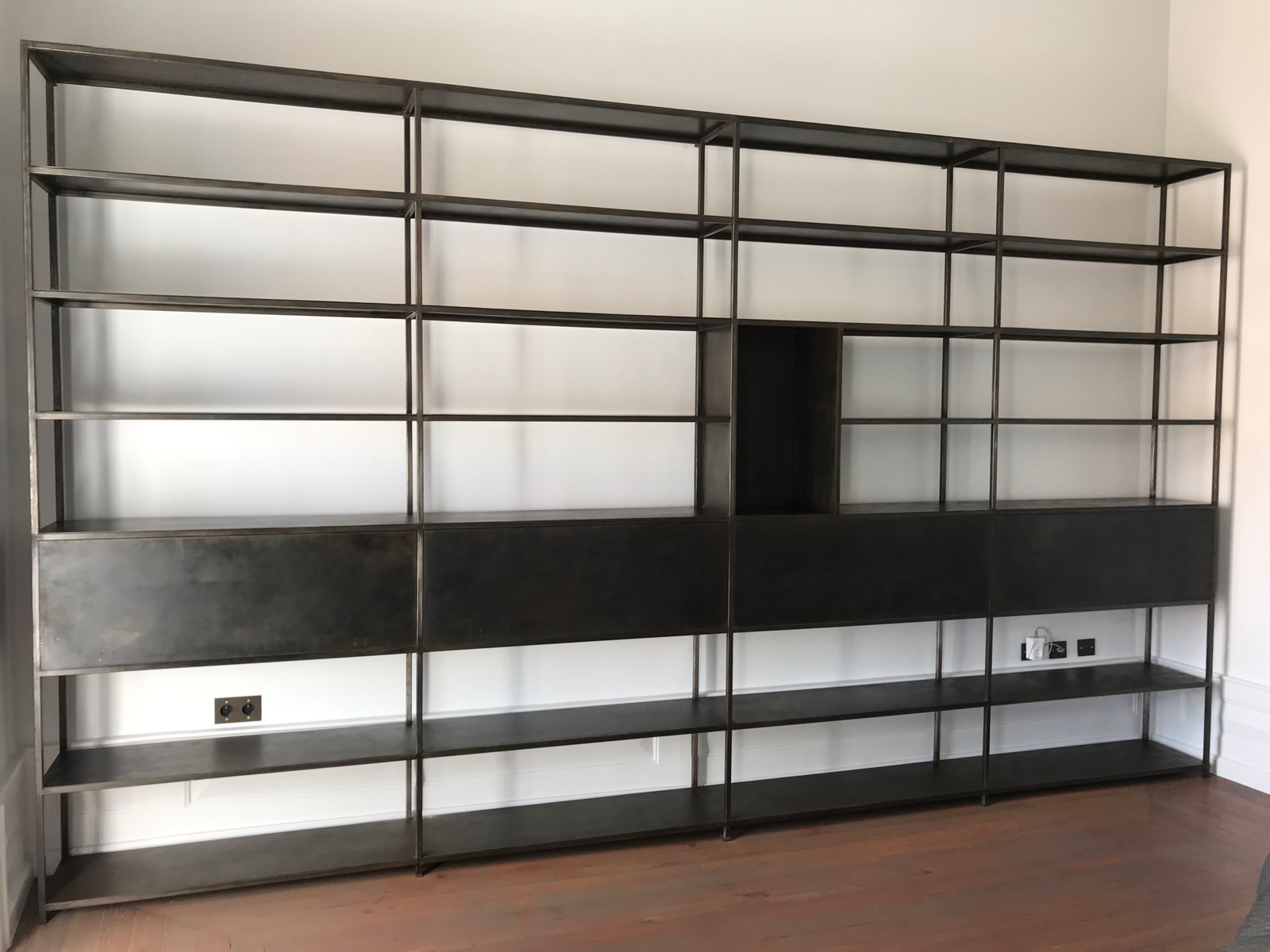 Full wall patinated shelving